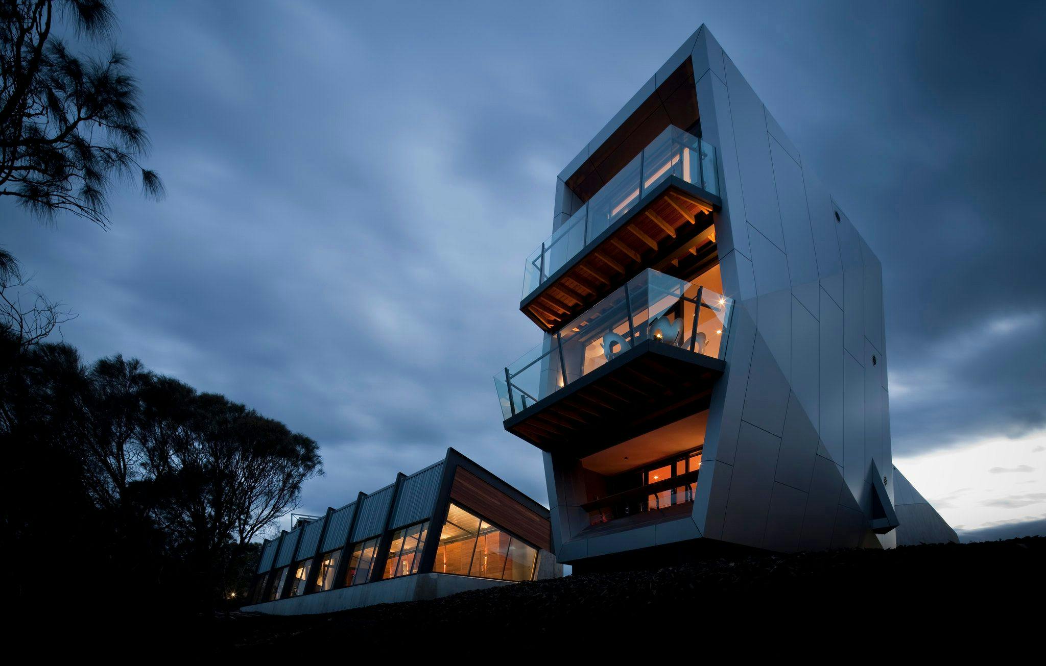 Roy pavilion lit during a dark sunset